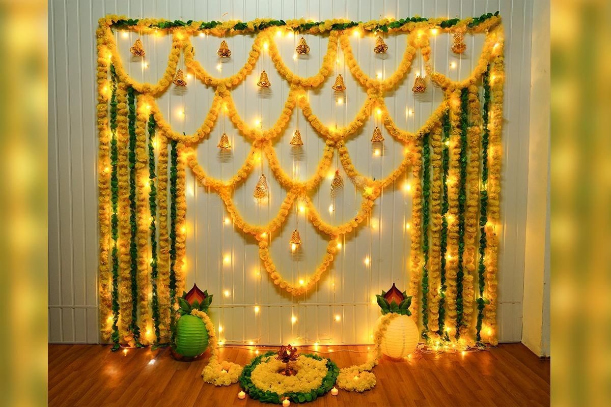 Yellow And Green Garlands Haldi And Mehndi Decor